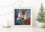 Framed artwork of a horse with red berries on a wall with festive decorations.