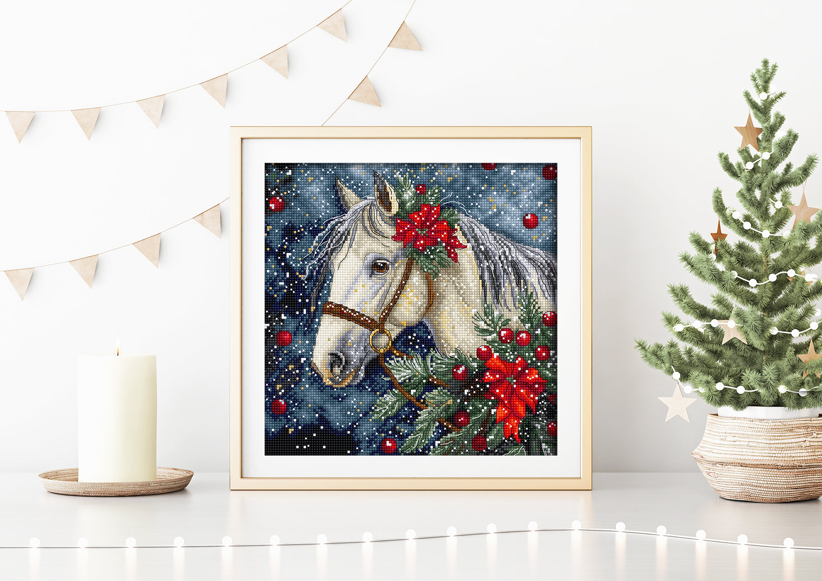 Framed artwork of a horse with red berries on a wall with festive decorations.
