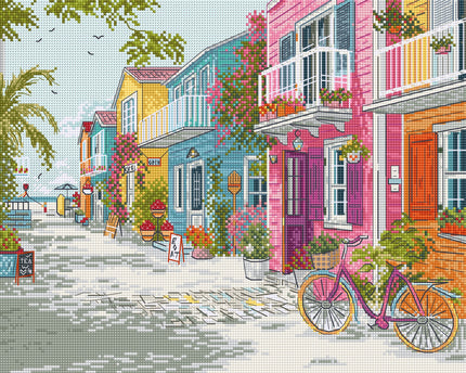 Colorful street scene with houses, a bicycle, and potted plants.