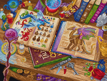 Colorful cross-stitch pattern of a table with books, potions, and magical items on a wooden surface.