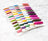Set of colorful embroidery threads on a white marble surface