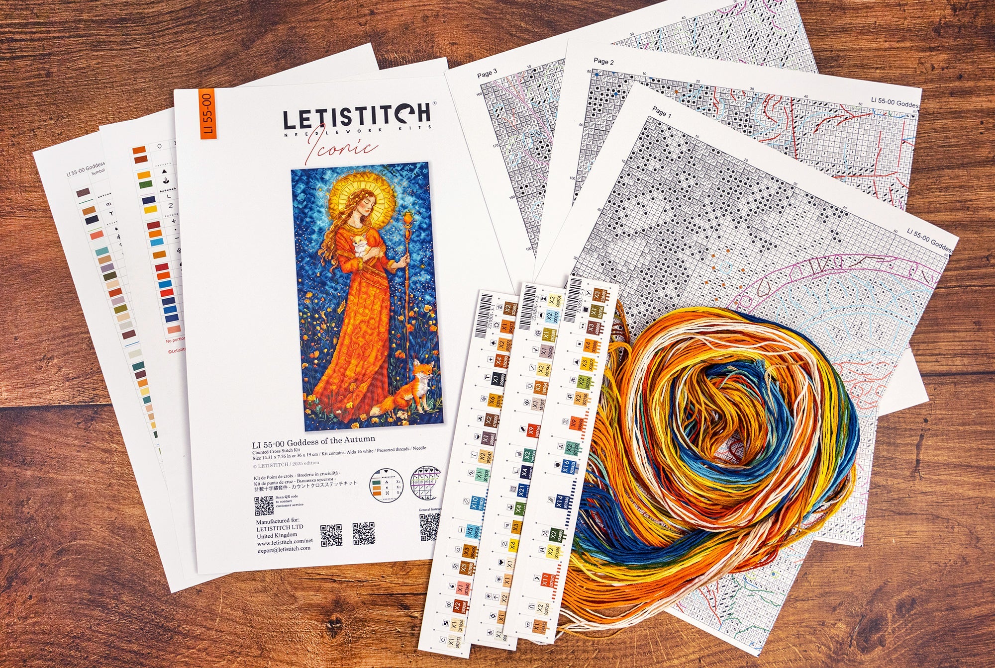 LetiStitch embroidery kit with pattern sheets and yarn on a wooden surface