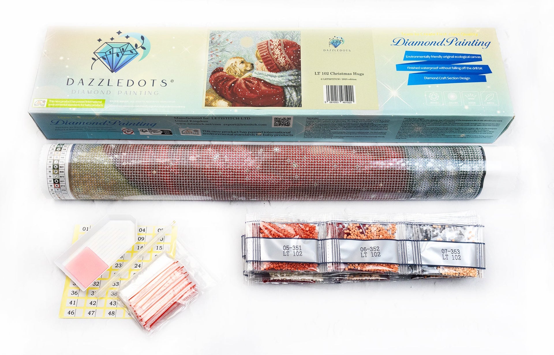 Dazzledots diamond painting kit with roll of fabric, accessories, and packaging.
