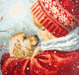 Close-up of a beaded artwork depicting a dog in a red coat with a snow-covered landscape.