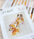 Cross-stitch kit with fox design on a white background