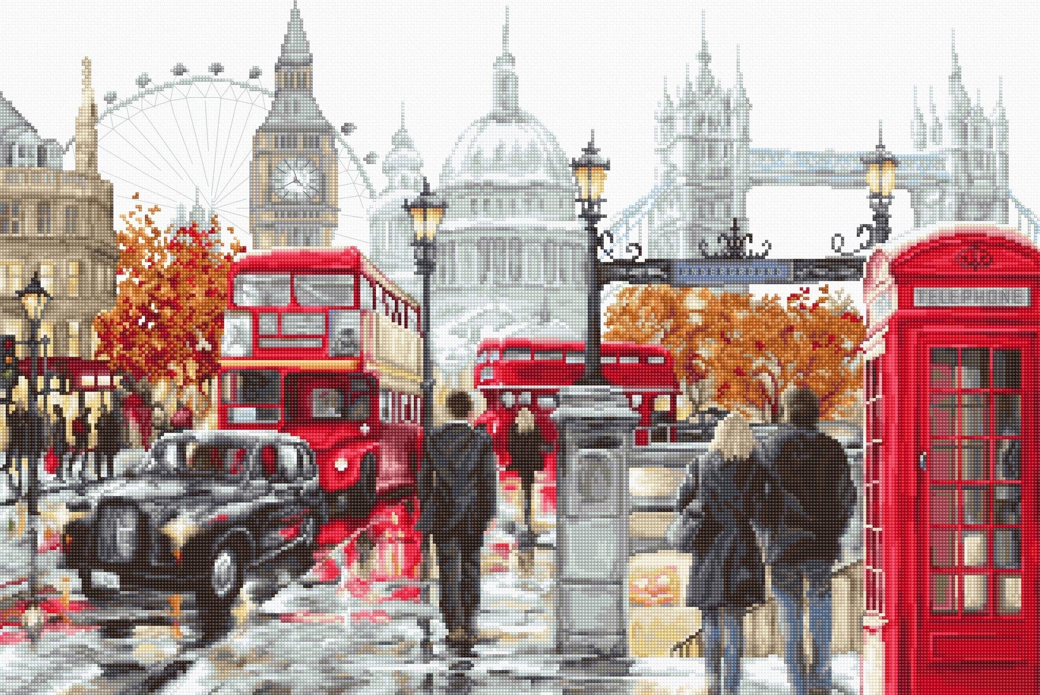 London scene with red double-decker bus, black taxi, and red phone box.