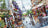 Cross-stitched city scene with Eiffel Tower and street details