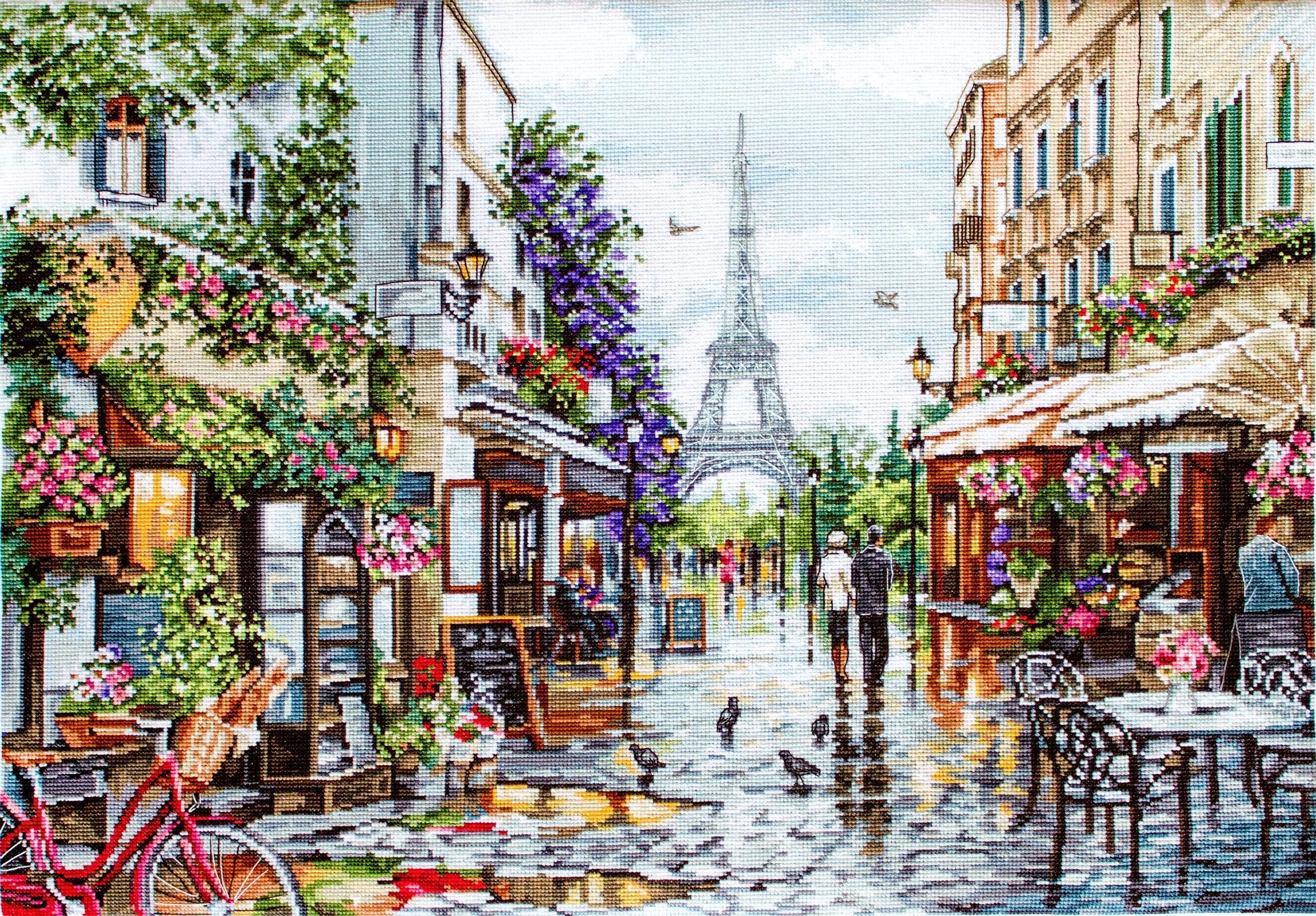 Painting of a Paris street scene with the Eiffel Tower in the background