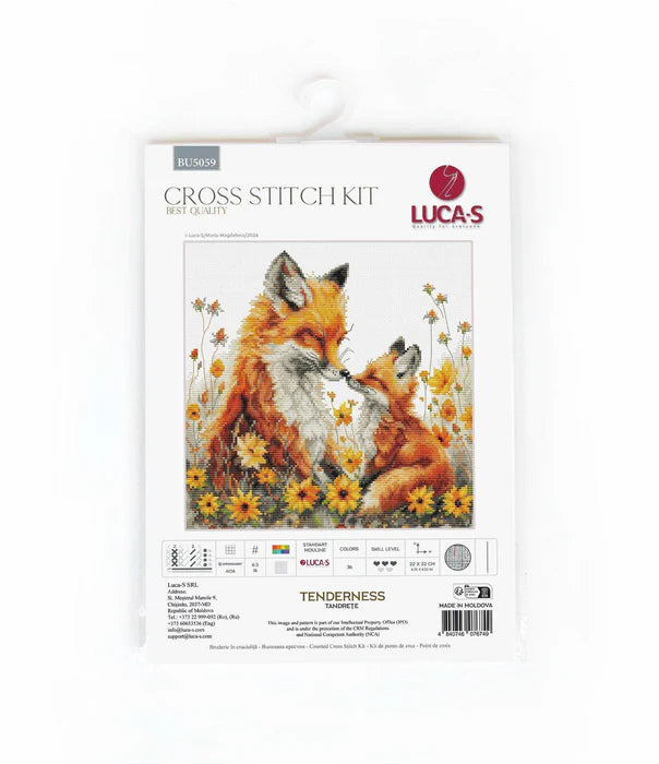 Cross stitch kit packaging featuring two foxes and flowers, brand 'Lucas' visible