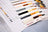Color swatches with 'LUCAS' branding on a grid background